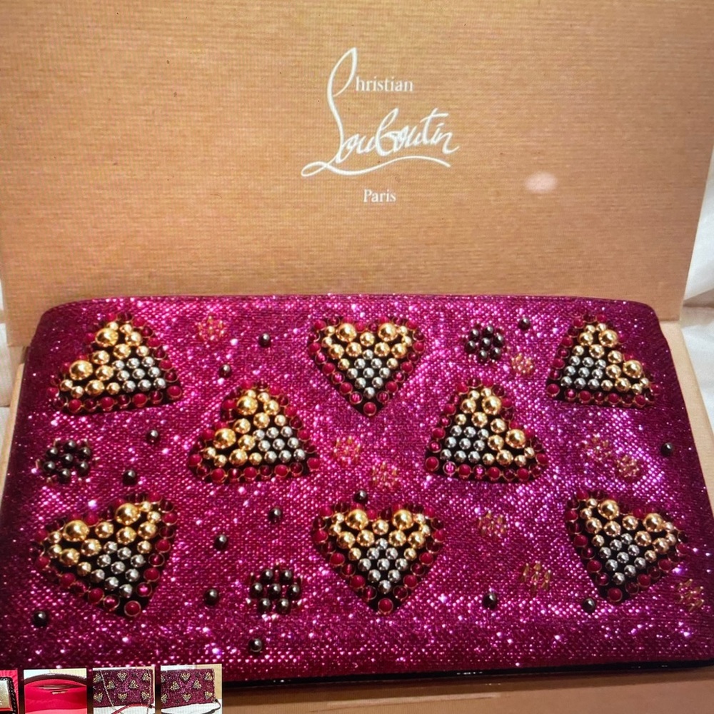 Christian Louboutin one of a kind beautiful unique clutch sold out everywhere.